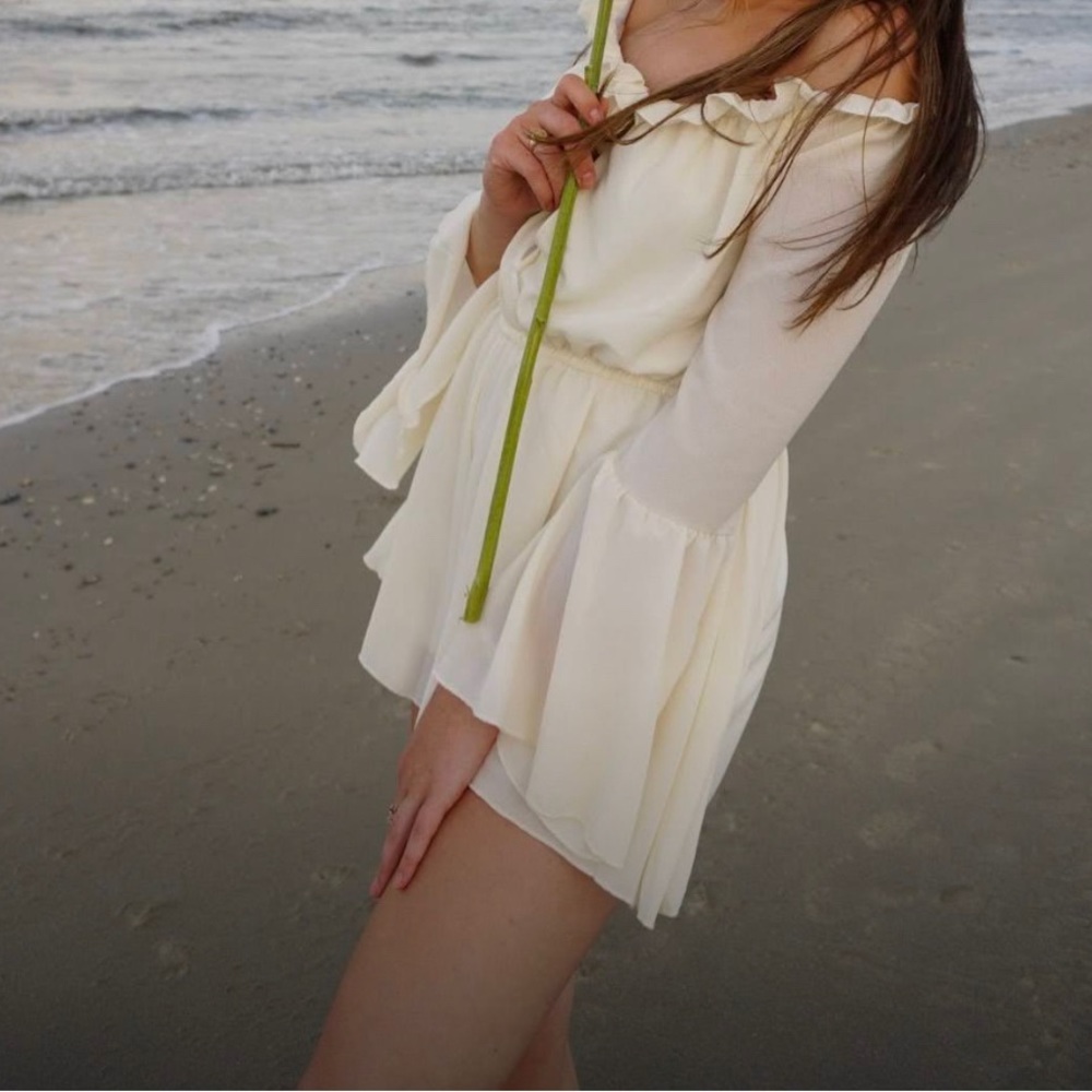 white romper long sleeve flowy off the shoulder